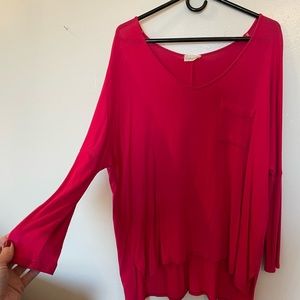 Fuchsia long sleeve top. Extremely comfortable & stretchy. No stains or snags.